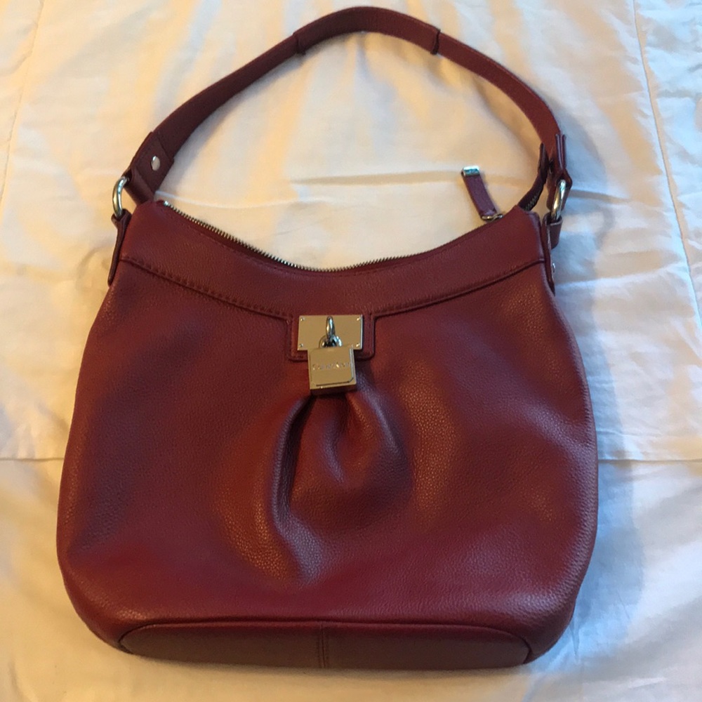 Red Calvin Klein purse.